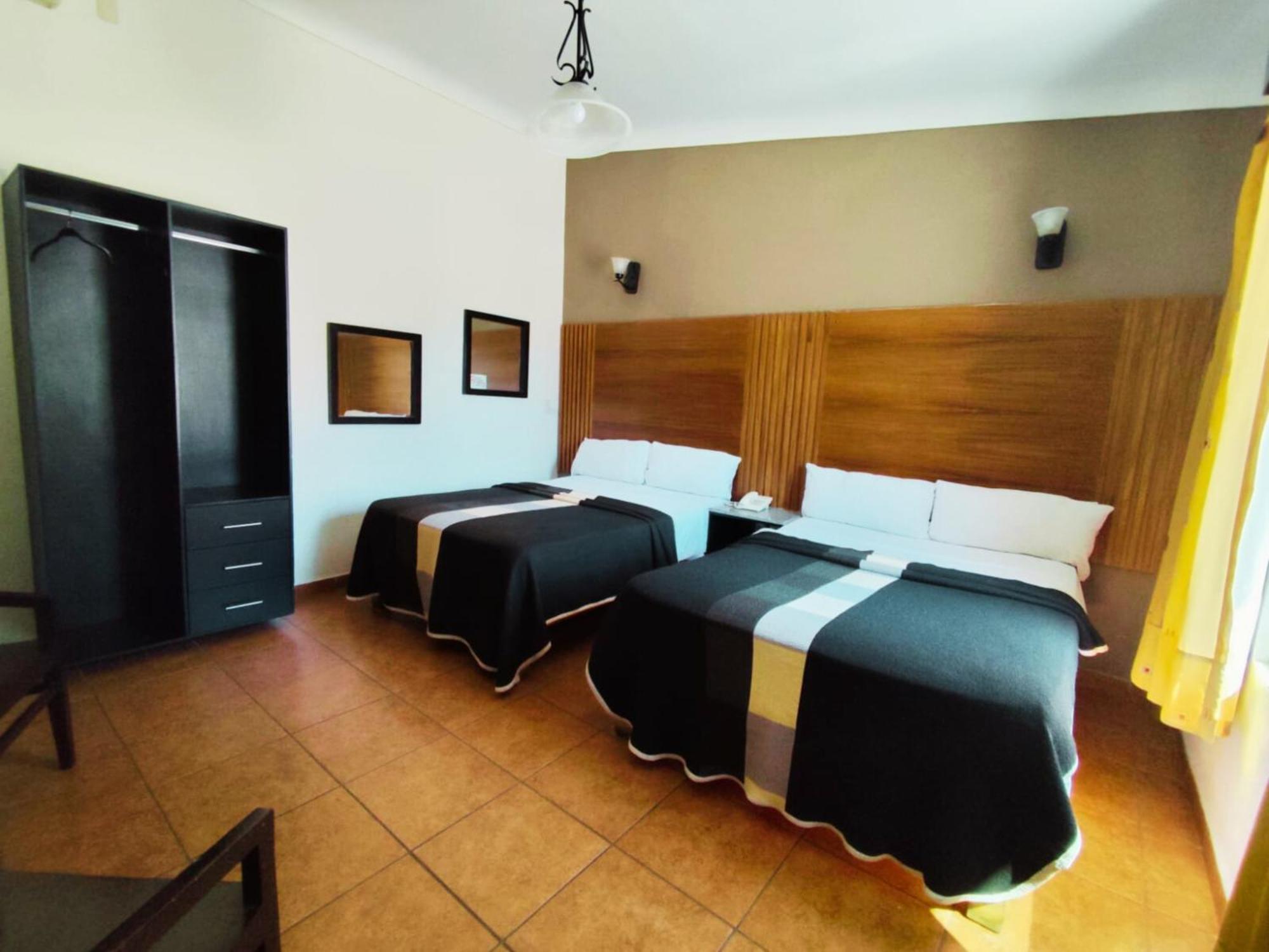 Hotel Aquiles グアダラハラ 部屋 写真